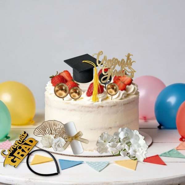 21 pieces graduation cake topper set decorated on white graduation party cake with gold floral and grad cap decor