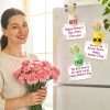 Ceramic Mini Vase Fridge Magnets set on kitchen fridge beside fresh carnation bouquet for Mother's Day vibe