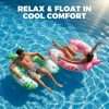Man and woman floating on inflatable pool float chairs for summer backyard pool relaxation