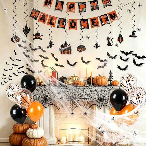 Halloween indoor decorations set on fireplace with mantel scarf banner 3D bats balloons and spider web