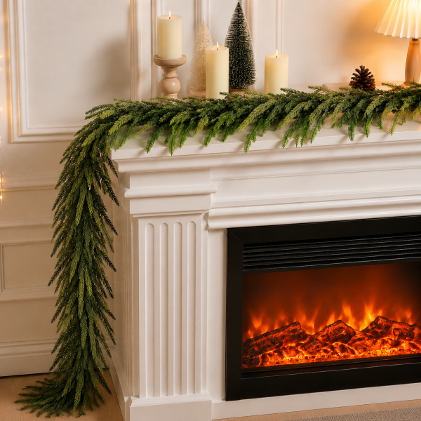 Real touch Norfolk pine Christmas garland draped on white fireplace mantel holiday greenery