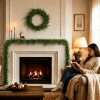 Norfolk pine garland and wreath on living room fireplace mantel cozy winter holiday scene