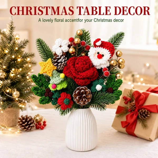 Christmas table decor – the crochet Santa, rose, tree and star arrangement unwrapped and set in a white ribbed vase next to a small Christmas tree and wrapped gifts