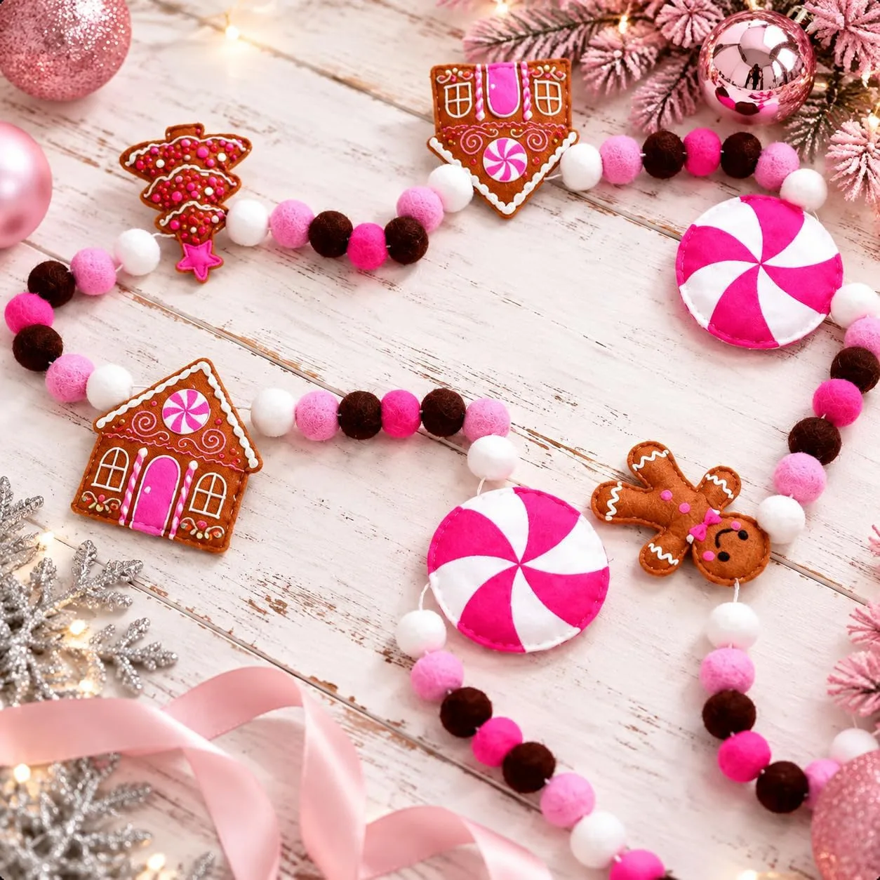 Allyix 10 ft pink Christmas felt garland – white, pink, hot pink and brown pom balls strung with felt gingerbread houses, gingerbread men, candy canes and peppermint candies