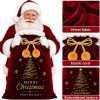 Close-up details of the Santa sack – burgundy velvet fabric, gold braided cord with pom-poms tied in a bow, gold tree artwork